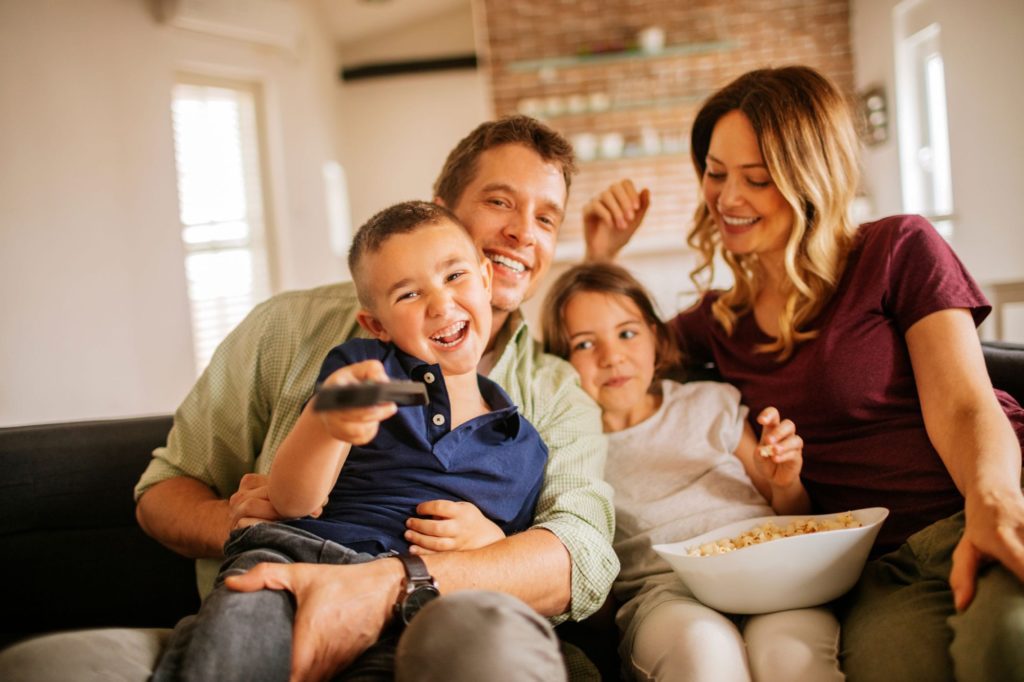 Happy family on the couch