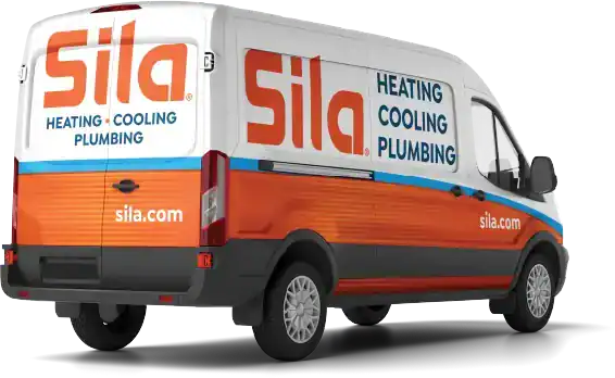 A white van with orange and blue Sila branding, advertising expert HVAC services, cooling, heating, and plumbing, is parked facing right.